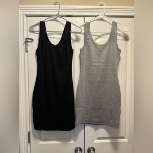 Two ribbed tank dresses size large.